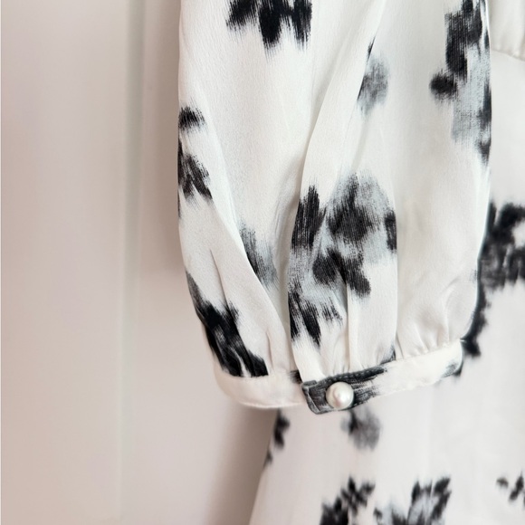 Ann Taylor’s Ikat Floral Mock Neck Flare Dress - Picture 8 of 9